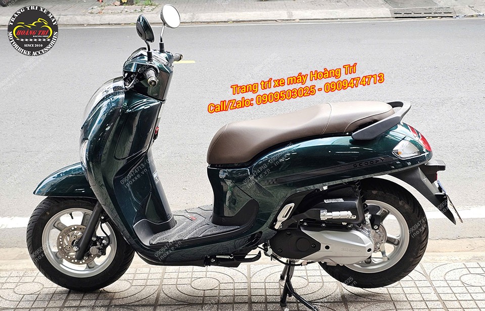 Gác chân phụ xe Scoopy