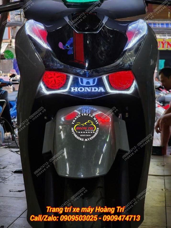 Độ một bên bi cầu và một bên mắt xoay Sharingan