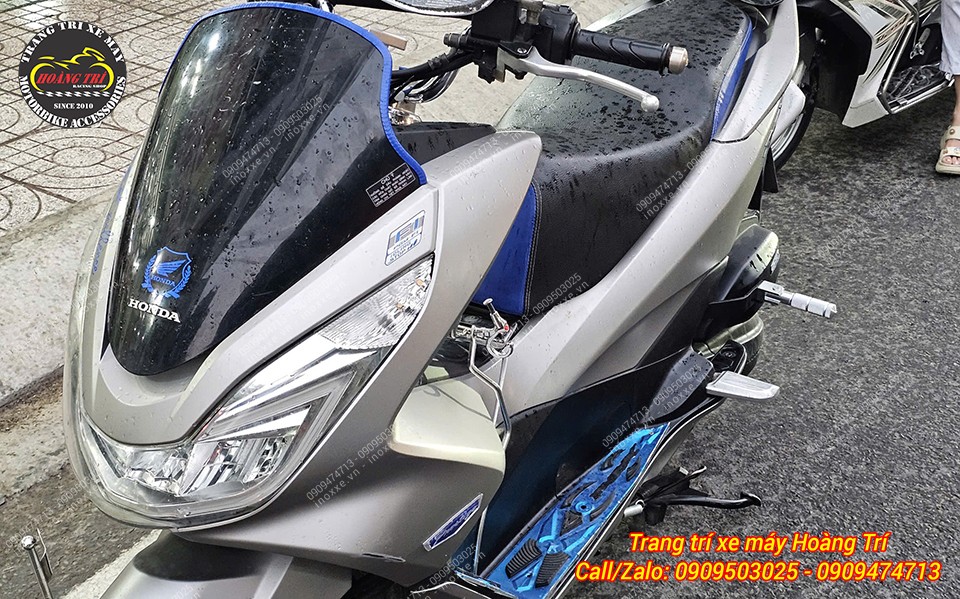 Gác chân phụ xe PCX
