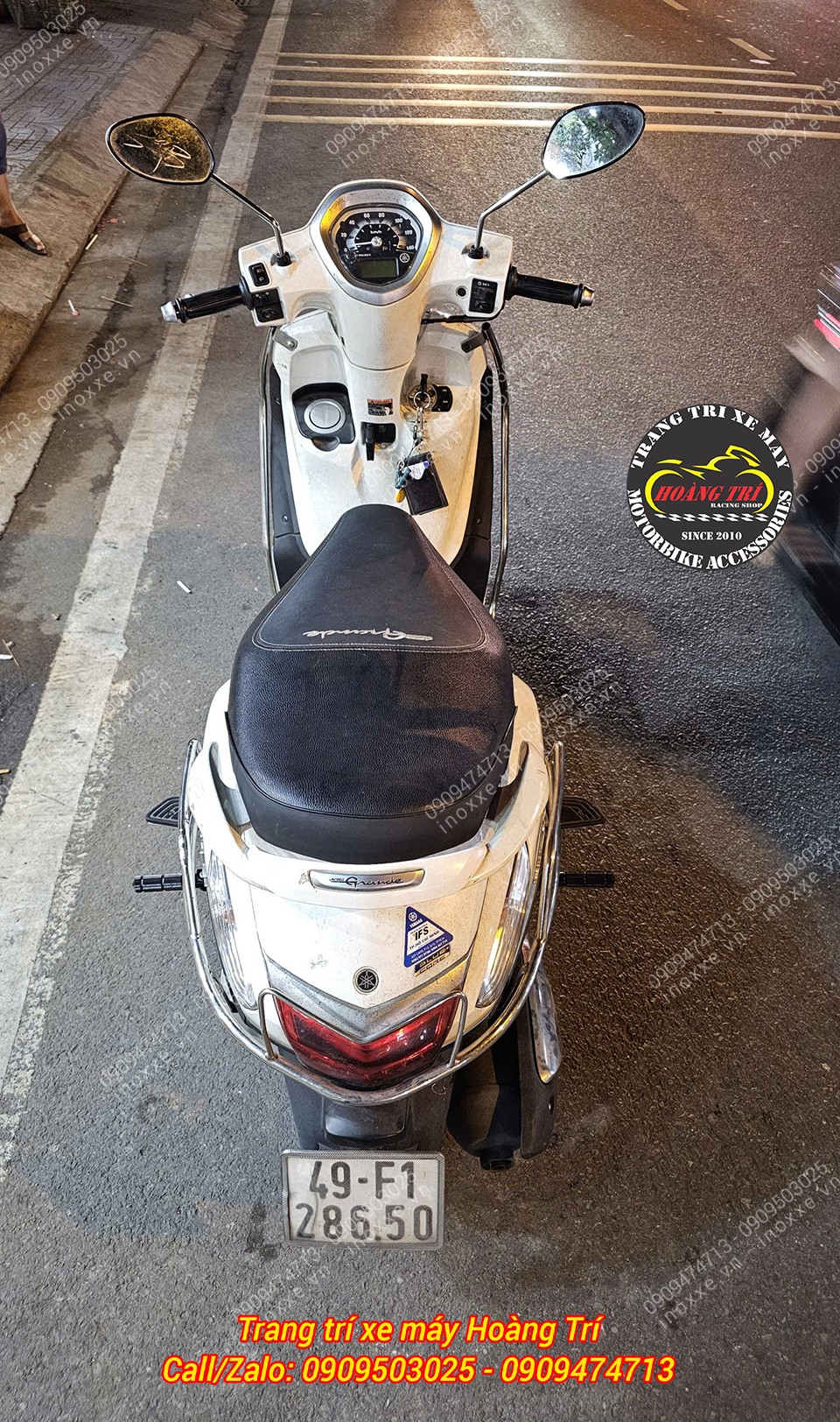 Gác chân phụ xe Grande