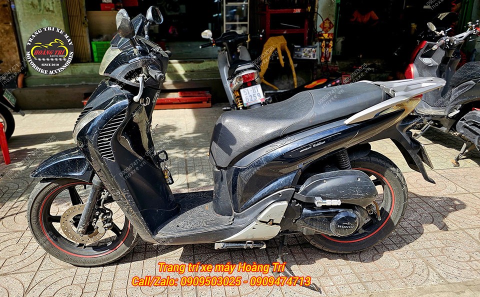 Gác chân phụ xe Sh