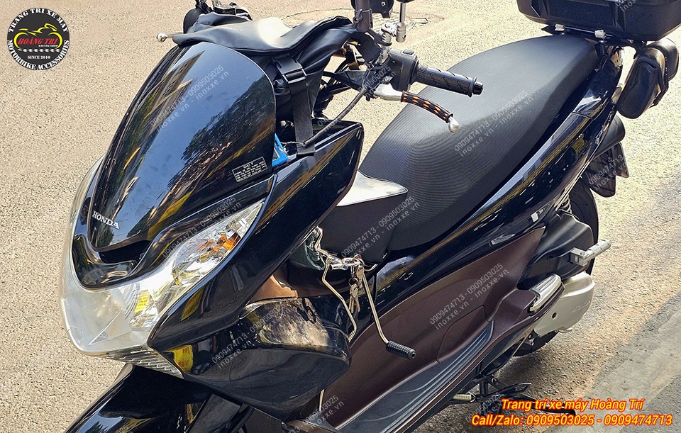 Gác chân phụ xe PCX